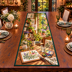 A rectangular watercolor paper on a drawing board shows translucent botanical leaves and wildflowers in progress. A pan paintbox, fine round brushes, clear rinse-water jar and folded cloth sit nearby. Botanical studies, art shelves and a sunny herb garden window complete the studio scene. Flat printed optical depth on table runner.