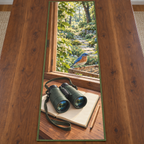 Bluebird Birdwatching Window Table Runner with flat printed binoculars and blank field notebook before a bluebird feeder and layered woodland window.