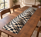 Rolling Wavy Checkerboard Table Runner with flat printed connected ivory charcoal checker waves and optical shadow depth.
