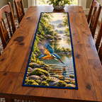 Kingfisher River Dive Table Runner with flat printed diving blue-orange bird, clear pebbled river and misty willow banks within navy bound edge.