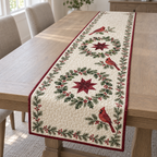One quilted cotton runner with three printed cardinals, two holly wreath star medallions, burgundy binding and visible meandering quilting