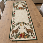 One ivory quilted table runner with four Alpine chamois, cranberry gifts, orange slices, juniper mistletoe arches and ochre bells, forest green binding cream reverse