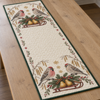 One ivory quilted table runner with four common redpolls, pear sleds, fir rosehip cinnamon arches and ochre snowflake stars, green binding