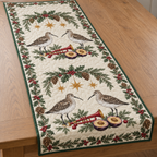 One ivory quilted table runner with four winter dunlins cranberry toy trumpets plum halves cedar bay holly ochre stars green binding sewn quilting