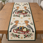 Four illustrated Eurasian hoopoes frame two cranberry toy sleds carrying navy gifts with ochre bows, with pear halves, cedar cones, holly, rosemary and ochre snowflakes on ivory with forest green binding. Flat printed Christmas artwork. Includes one table runner. Quilted cotton hero with visible sewn quilting and fabric drape.