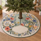 One tree skirt with a wildflower maker garden, sea-glass studio arch, embroidery hoop, paintbrush motifs and blank oatmeal-linen name plaque.