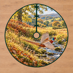 Pheasant Meadow Flight Tree Skirt with flat printed launching ring-necked pheasant and layered meadow brook.