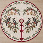One ivory quilted tree skirt with four printed great spotted woodpeckers, fir hazelnut arches and six cookie stars, cranberry binding, centered opening and three ties