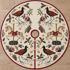 Four illustrated northern jacanas frame cream toy carousel horses with cranberry saddles on navy pedestals, with fig halves, cedar cones, holly, mistletoe and ochre stars on ivory with cranberry binding. Flat printed Christmas artwork. Includes one circular tree skirt with a center opening and tie closure. Visible sewn quilting and continuous radial opening.