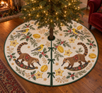 Iora Starfruit Rocking Coati tree skirt three yellow black white-wing birds two brown ringed-tail rocking coatis starfruit green binding sewn channels centered opening radial slit three ties in Christmas room.
