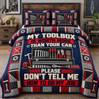 My Toolbox My Rules quilted 3-piece bedding set on a made bed with two matching pillow shams