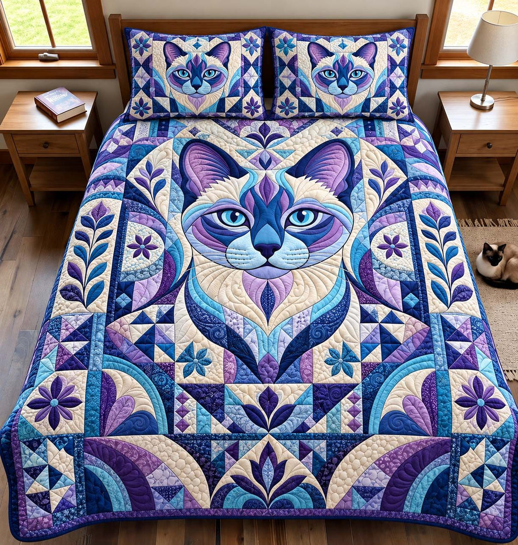 Mystic Cat quilted 3-piece bedding set on a made bed with two matching pillow shams