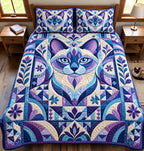 Mystic Cat quilted 3-piece bedding set on a made bed with two matching pillow shams