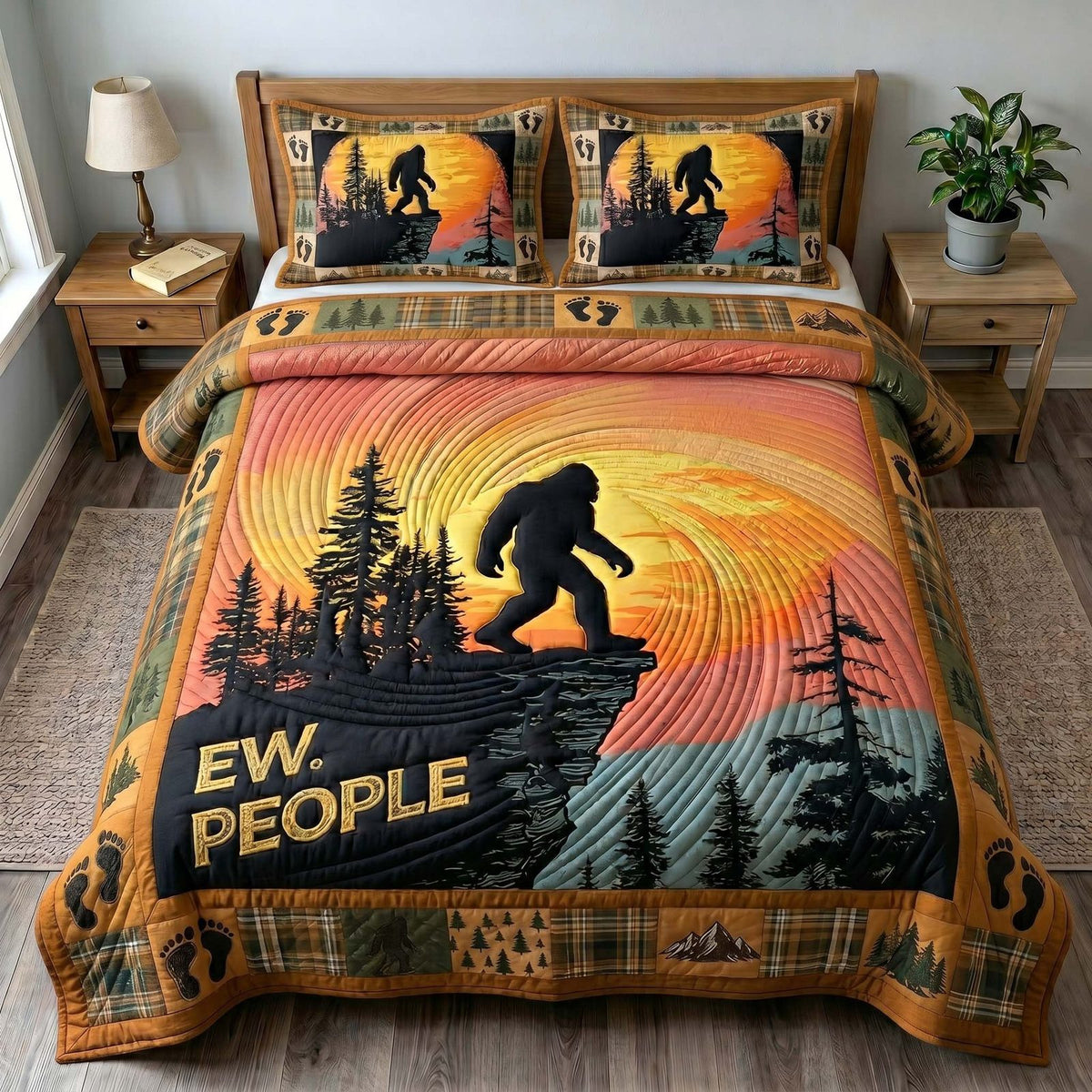 Mystic Sasquatch Ew People quilted 3-piece bedding set on a made bed with two matching pillow shams