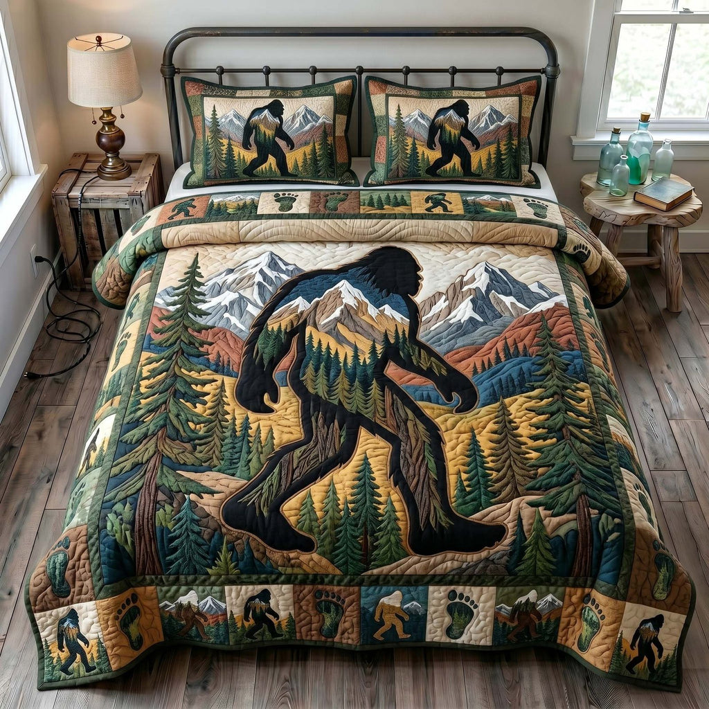 Mystic Sasquatch Peaks quilted 3-piece bedding set on a made bed with two matching pillow shams