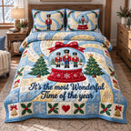Nutcracker Snow Globe quilted 3-piece bedding set on a made bed in a winter-styled bedroom