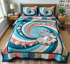 Ocean Pearl Swirl quilted 3-piece bedding set on a made bed in a light coastal bedroom