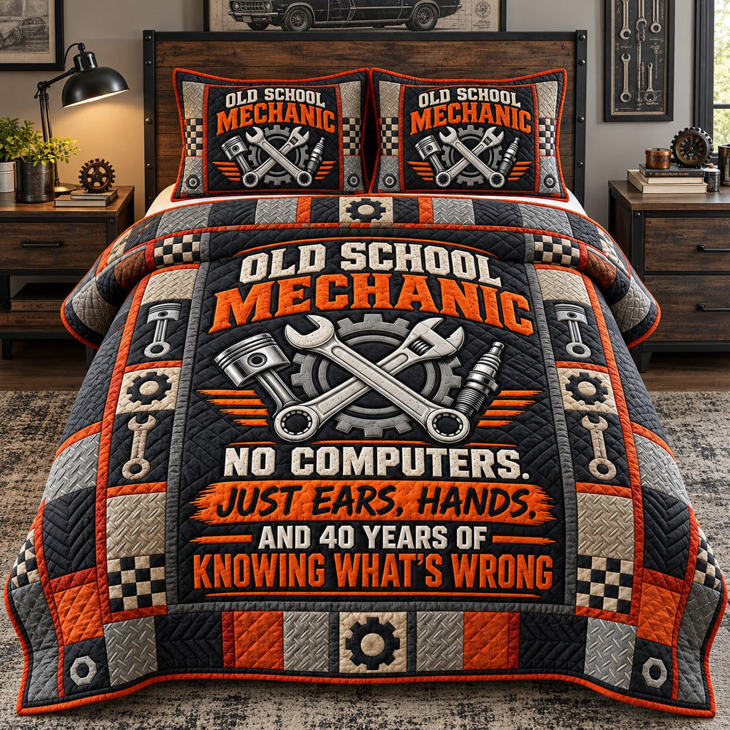 Old School Mechanic quilted 3-piece bedding set on a made bed with two matching pillow shams