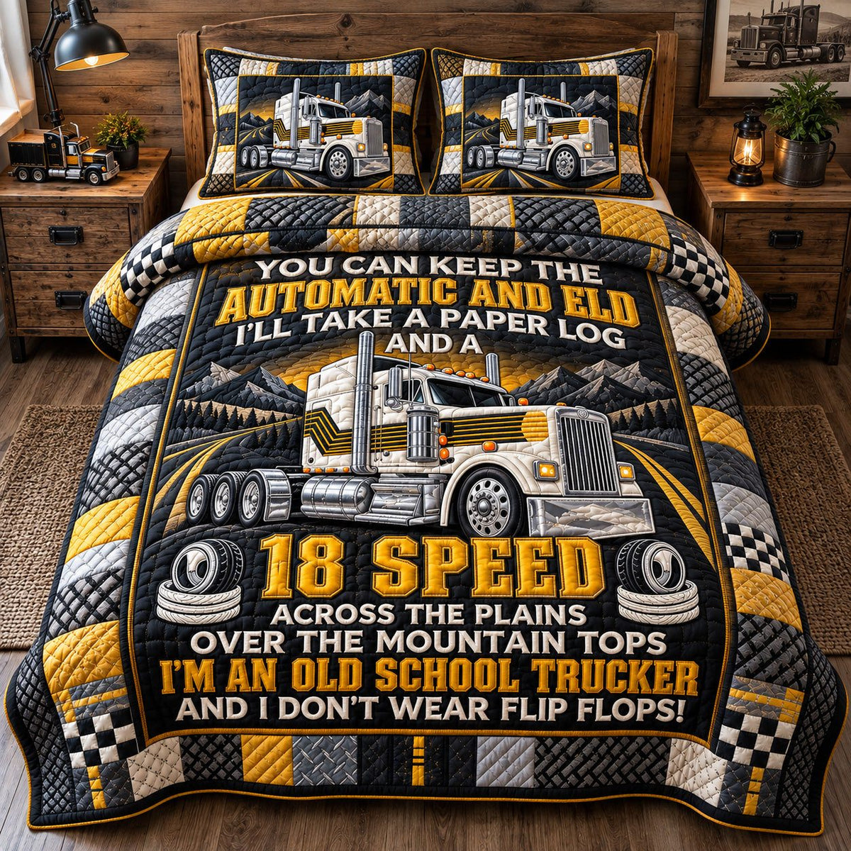 Old School Trucker quilted 3-piece bedding set on a made bed with two matching pillow shams