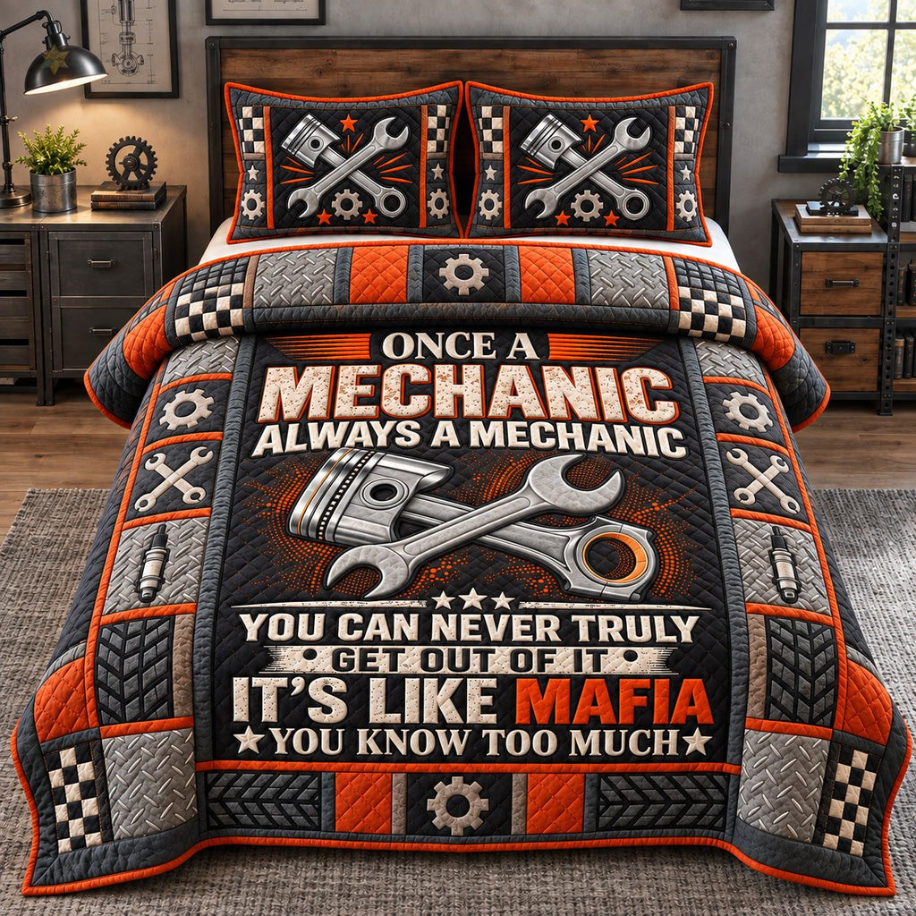 Once A Mechanic Always A Mechanic quilted 3-piece bedding set on a made bed with two matching pillow shams