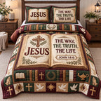 Open Bible Jesus Way Truth Life quilted 3-piece bedding set on a made bed in a softly lit bedroom