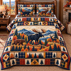 Orange Sunset Moose Bear Patchwork quilted 3-piece bedding set on a made bed in a farmhouse bedroom