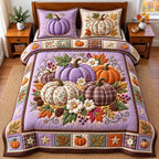 Pastel Pumpkin Harvest quilted 3-piece bedding set on a made bed against a dark styled interior