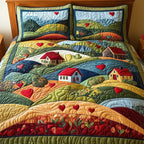 Pastoral Dreams Hills quilted 3-piece bedding set on a made bed with two matching pillow shams