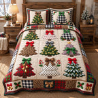 Patchwork Christmas Trees quilted 3-piece bedding set on a made bed in a winter-styled bedroom