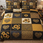 Patchy Sunflower quilted 3-piece bedding set on a made bed with two matching pillow shams