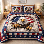 Patriot Breakthrough quilted 3-piece bedding set on a made bed in a warmly lit bedroom