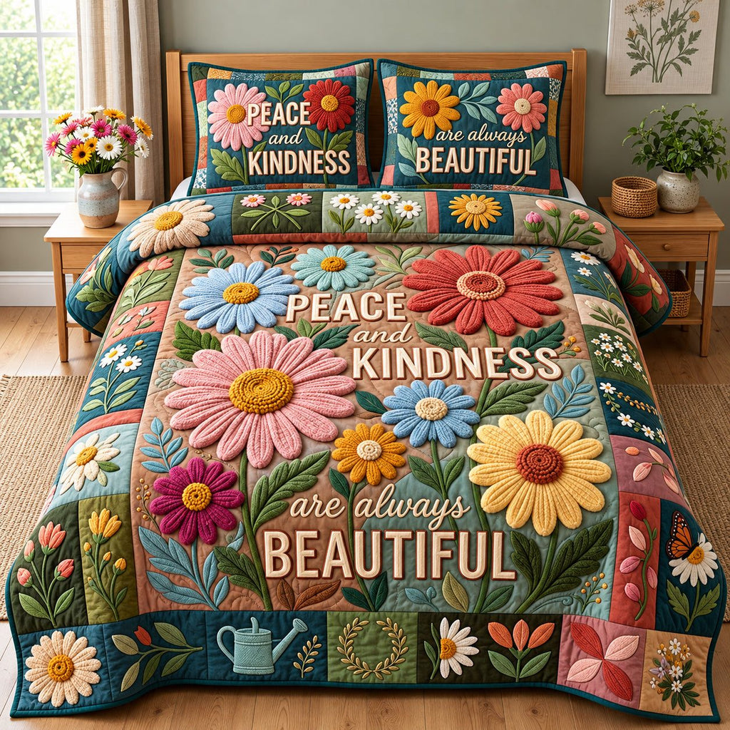 Peace And Kindness quilted 3-piece bedding set on a made bed with two matching pillow shams