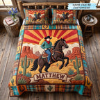 Personalized Cowboy Sunburst Canyon quilted 3-piece bedding set on a made bed in a rustic timber bedroom
