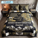 Personalized Heroes Never Forgotten Camo quilted 3-piece bedding set on a made bed with two matching pillow shams