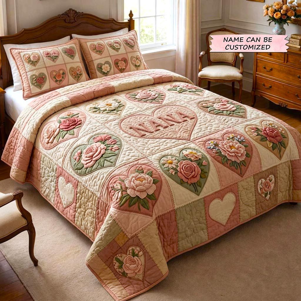 Personalized Nana Rose Hearts quilted 3-piece bedding set on a made bed with two matching pillow shams