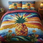 Pineapple Rays Sky quilted 3-piece bedding set on a made bed with two matching pillow shams
