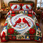 Poinsettia Swirl Red Cardinal quilted 3-piece bedding set on a made bed in a winter-styled bedroom