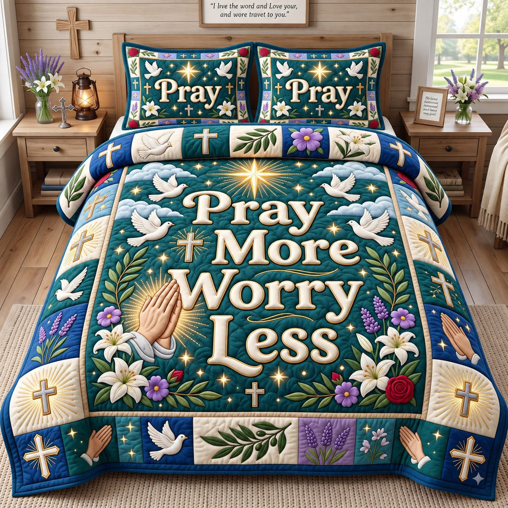 Praying Hands Pray More Worry Less quilted 3-piece bedding set on a made bed in a softly lit bedroom