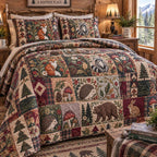 Rustic Caribou Hideaway quilted 3-piece bedding set on a made bed in a farmhouse bedroom