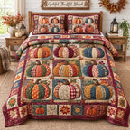 Rustic Pumpkin Cottage quilted 3-piece bedding set on a made bed against a dark styled interior