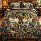 Sacred Roots Tree quilted 3-piece bedding set on a made bed in a softly lit bedroom