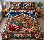 Santa Cabin Nap quilted 3-piece bedding set on a made bed in a winter-styled bedroom