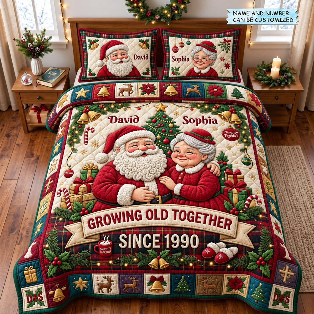 Santa Couple 3-Piece Quilted Bedding Set QTCUZ quilted 3-piece bedding set on a made bed in a winter-styled bedroom