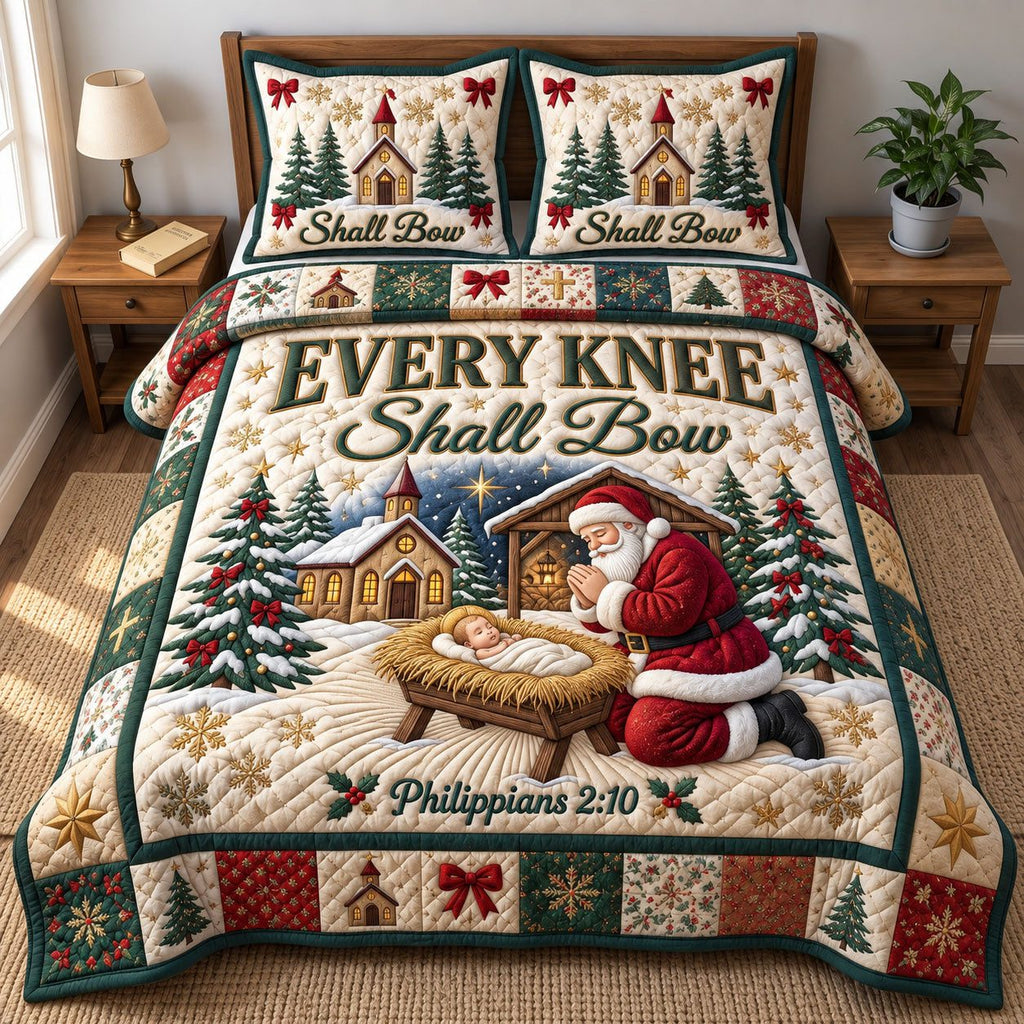 Santa Kneeling Every Knee Shall Bow quilted 3-piece bedding set on a made bed in a winter-styled bedroom