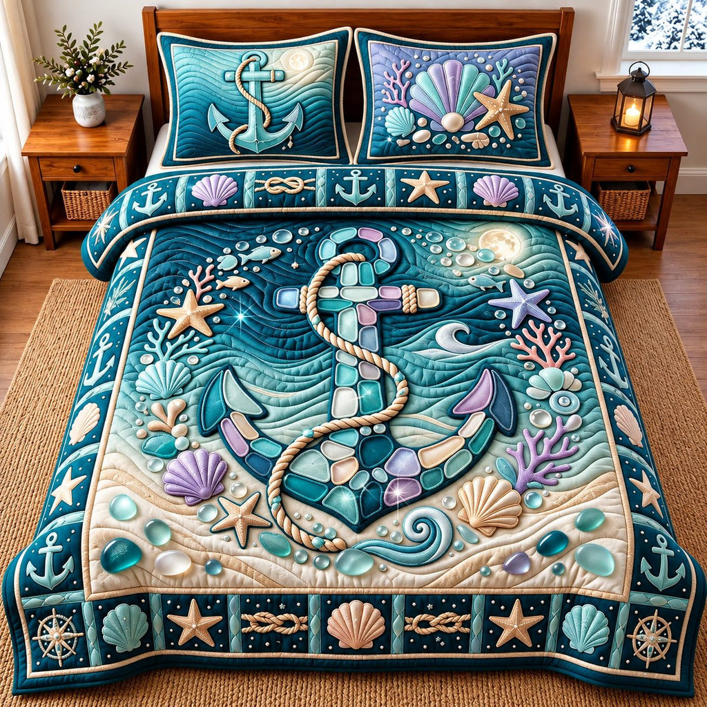 Sea Glass Ocean Anchor quilted 3-piece bedding set on a made bed in a light coastal bedroom