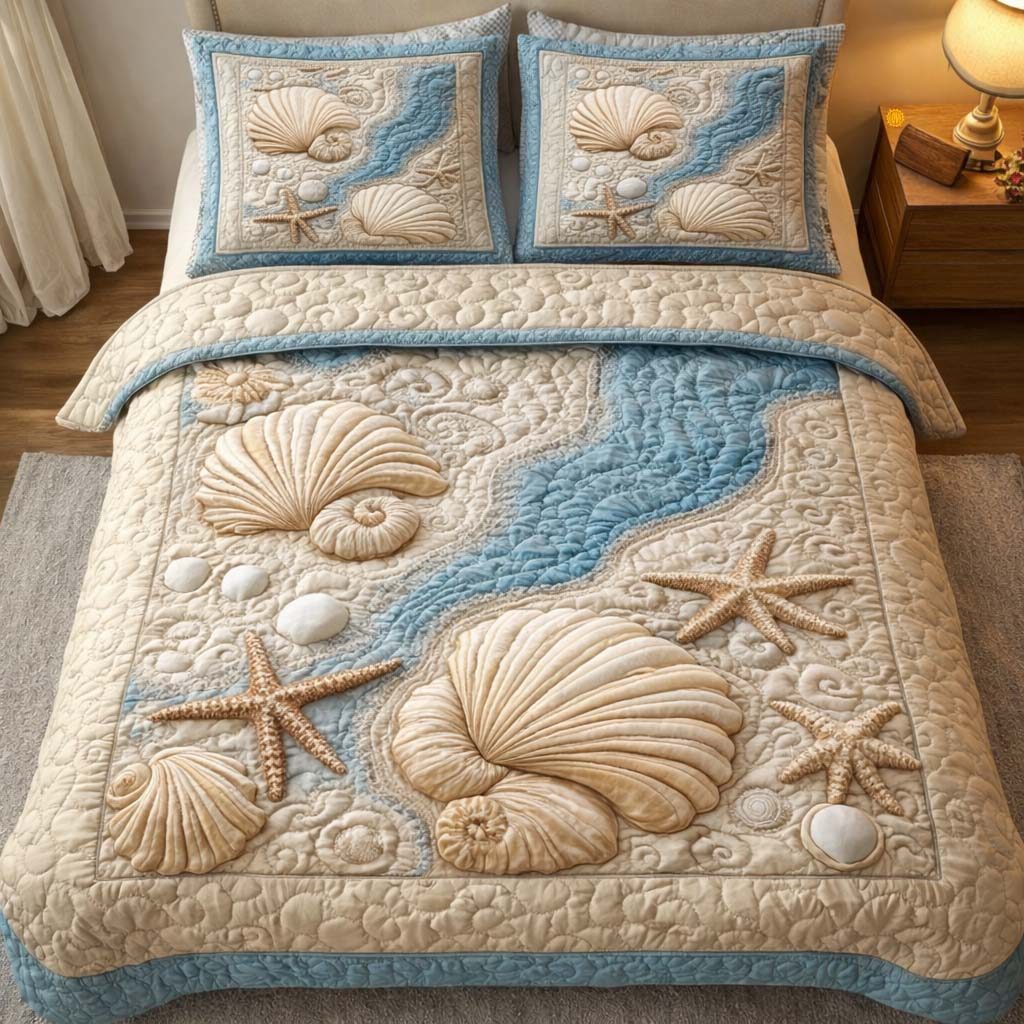 Seashell River quilted 3-piece bedding set on a made bed in a light coastal bedroom