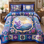 See The King In His Beauty quilted 3-piece bedding set on a made bed with two matching pillow shams