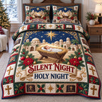 Silent Night Nativity quilted 3-piece bedding set on a made bed in a winter-styled bedroom
