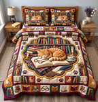 Sleeping Ginger Cat Library quilted 3-piece bedding set on a made bed with two matching pillow shams