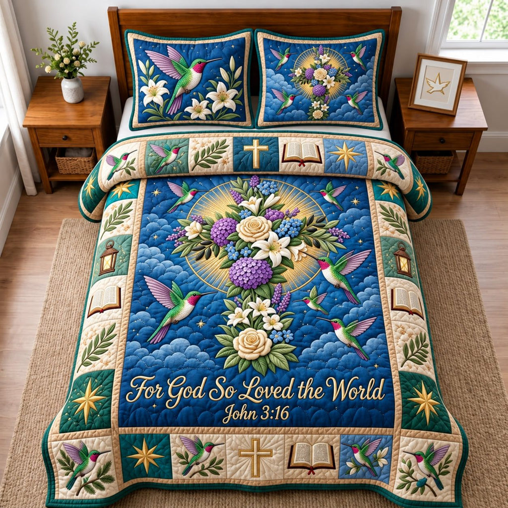So Loved The World quilted 3-piece bedding set on a made bed with two matching pillow shams